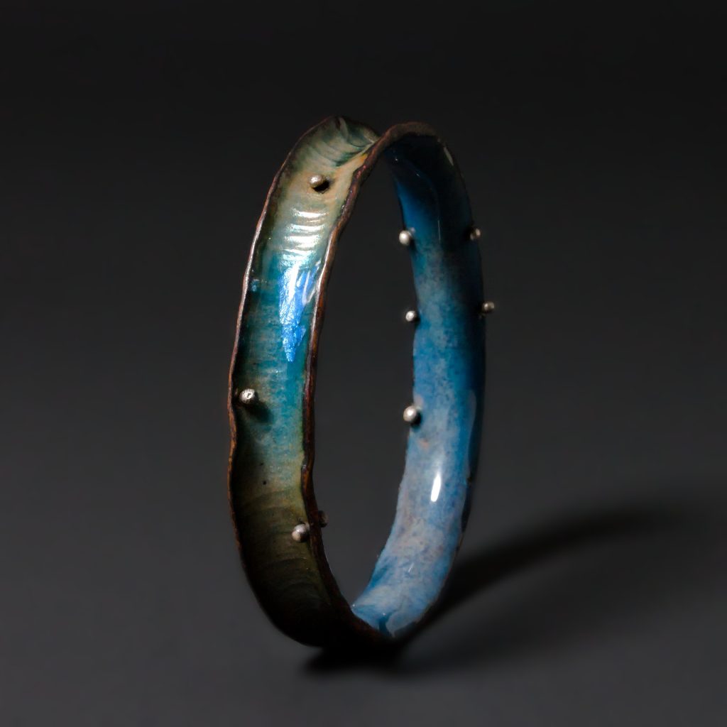 hammered copper enamel bangle, blue, with sterling silver