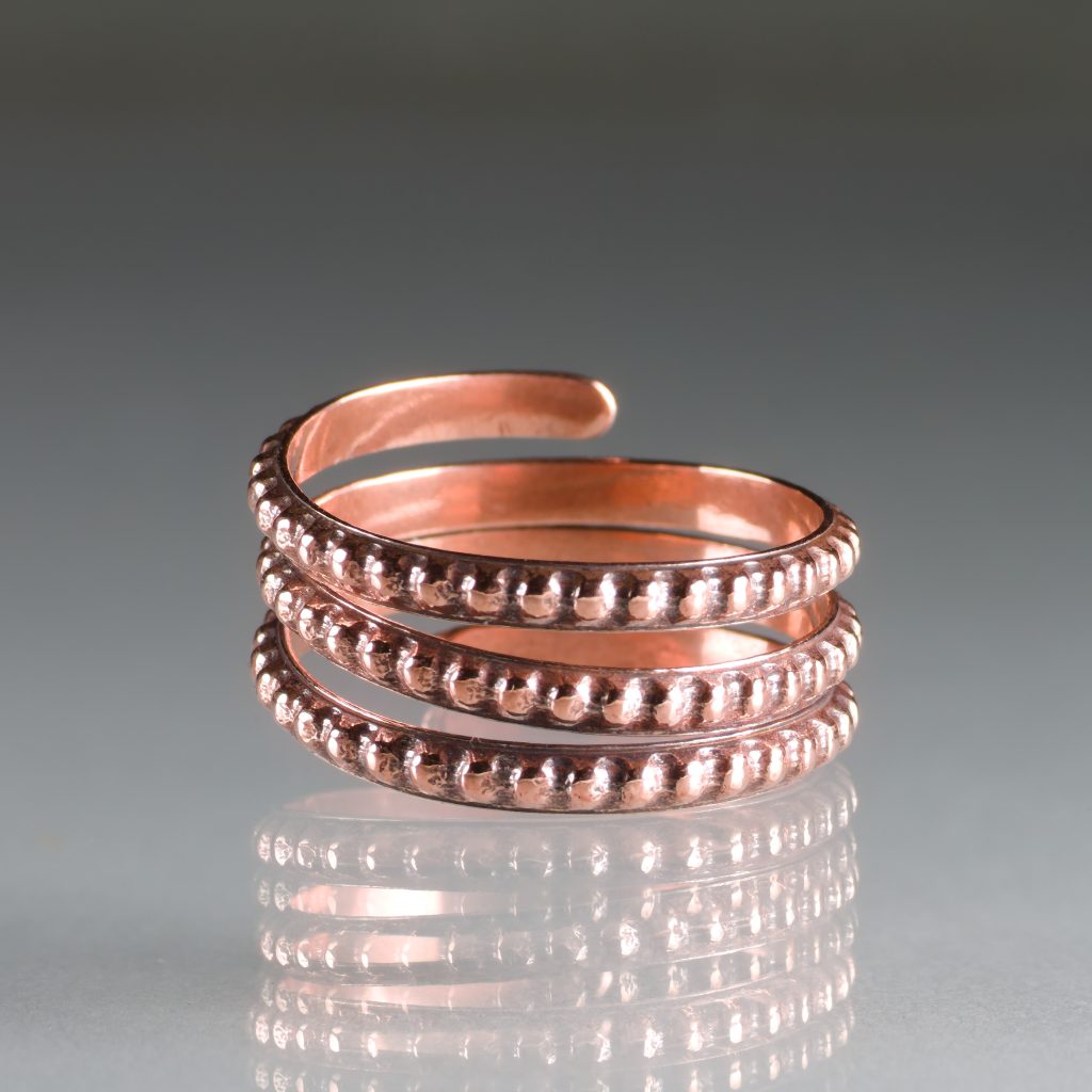 copper wrap ring with embossed bubble pattern