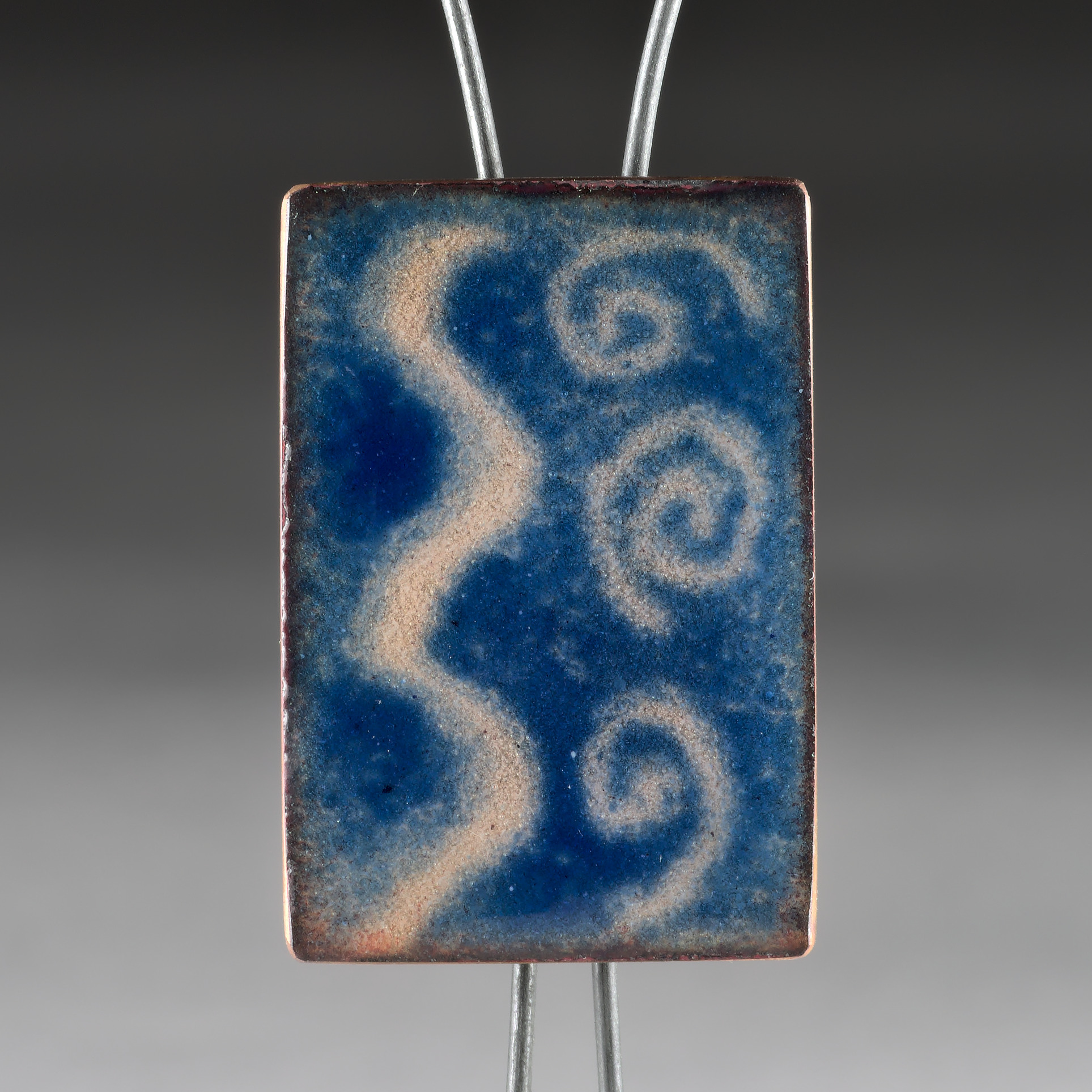 tiny enamel art magnet of river and spiral